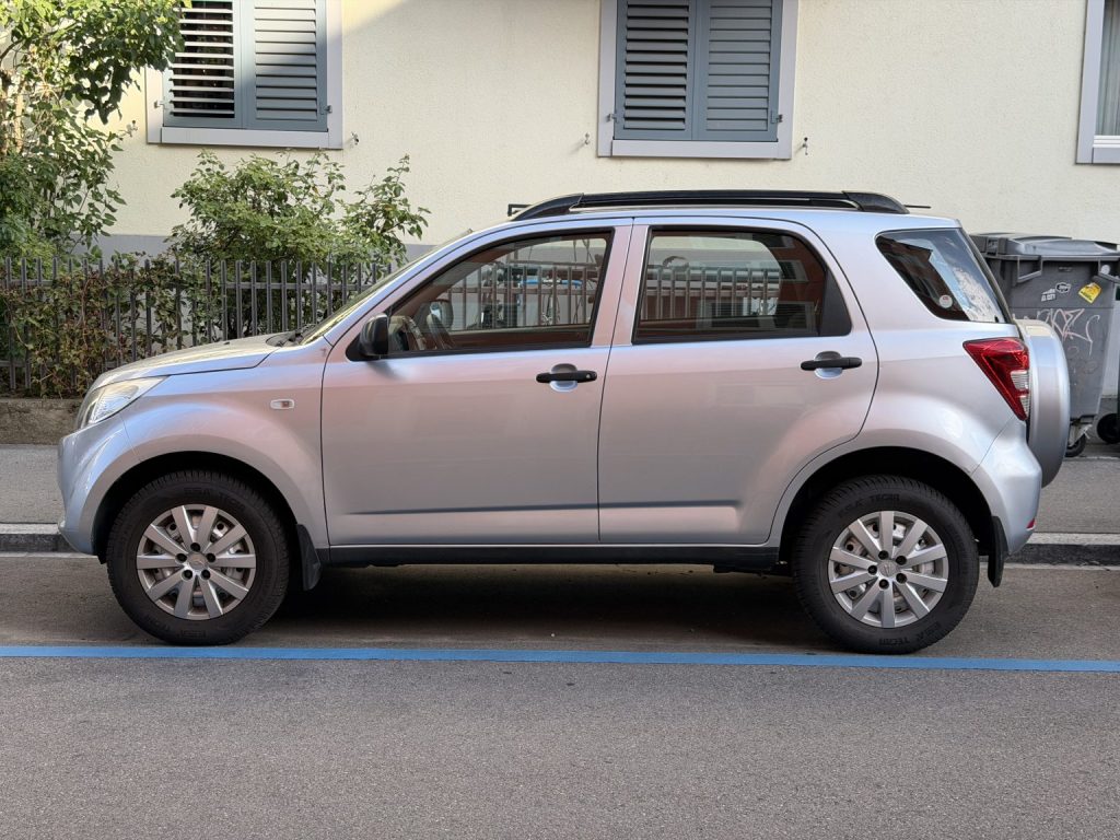 Silver Daihatsu Terios 4×4 parked on a street in Zürich